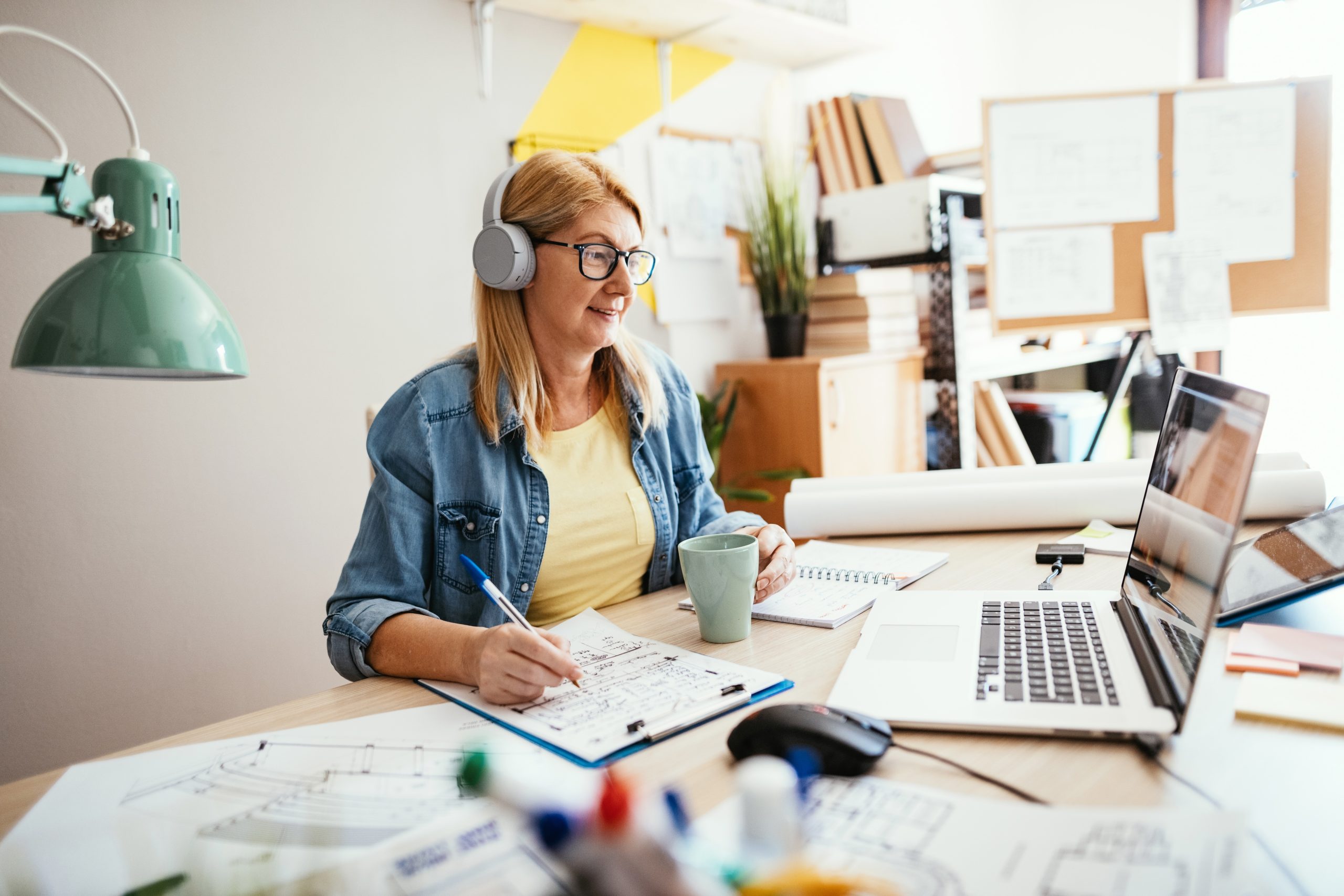 Mature woman working on a laptop. 