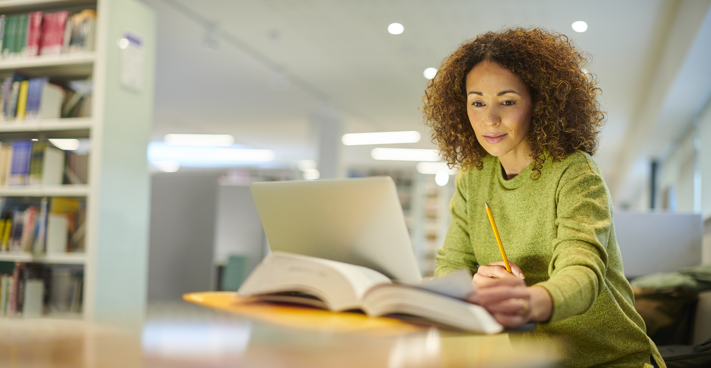 mature student in college library
