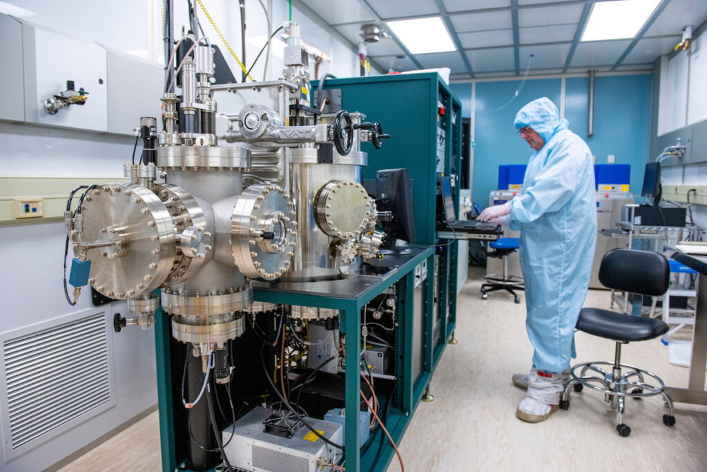 Students conduct experiments inside the School of Engineering Clean Room.