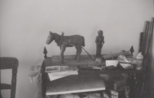 P4062: Wood carving of a man and horse
