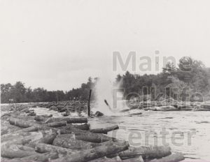 P4899: Dynamite was used in the workplace not only for clearing fields of rocks. Here it is being used to break a log jam on the Saco River.