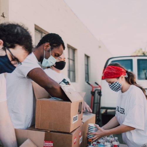 stock photo of three volunteers at a food rescue