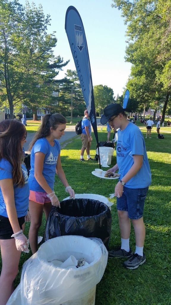 Two GCI Staff members at composting event on the mall