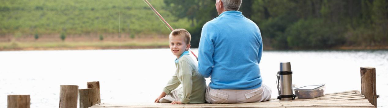 Grandfather fishing with gradson