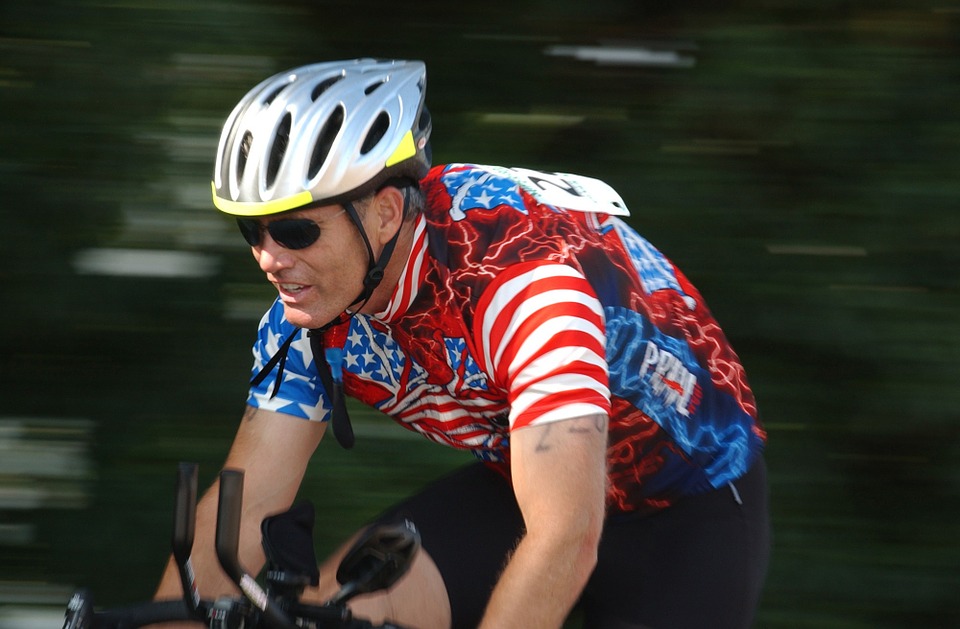 man cycling in American Flag outfit