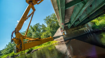 construction equipment under bridge