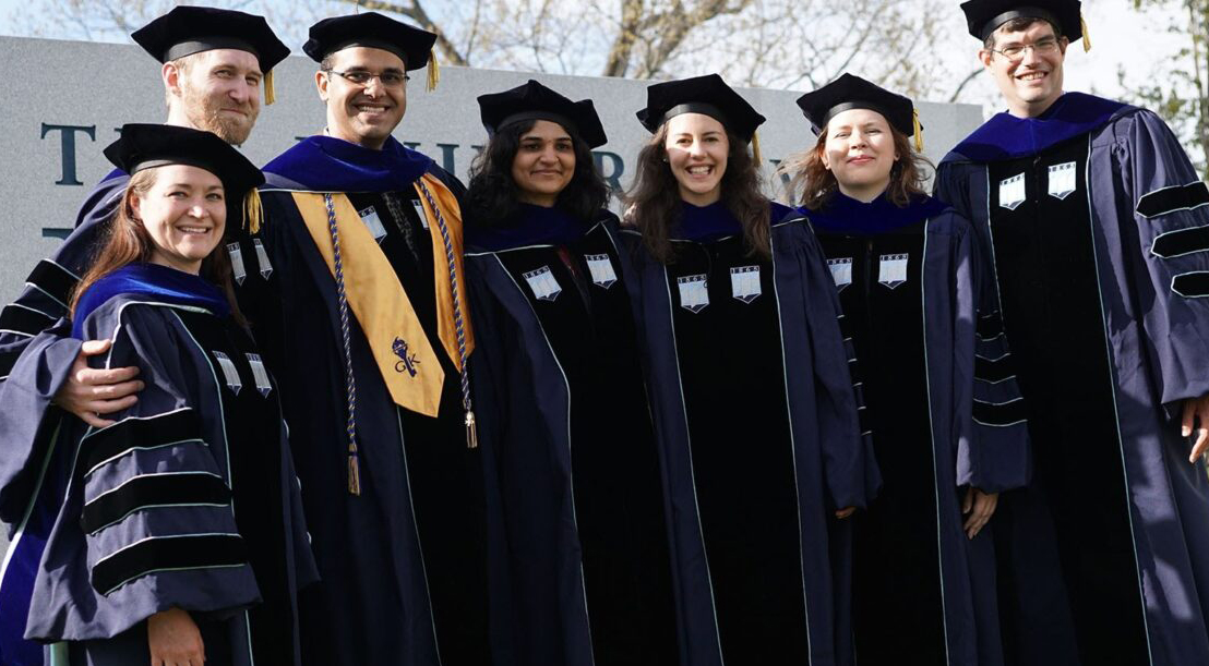 Graduate students commencement group photo