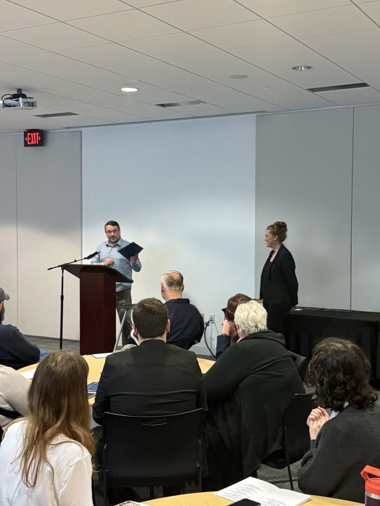 A student receiving an award