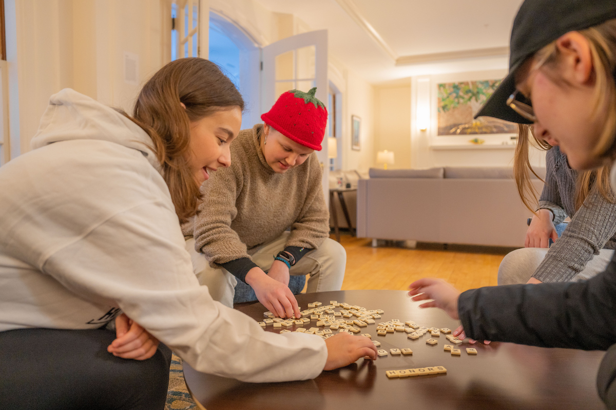 A photo of students playing scrabble