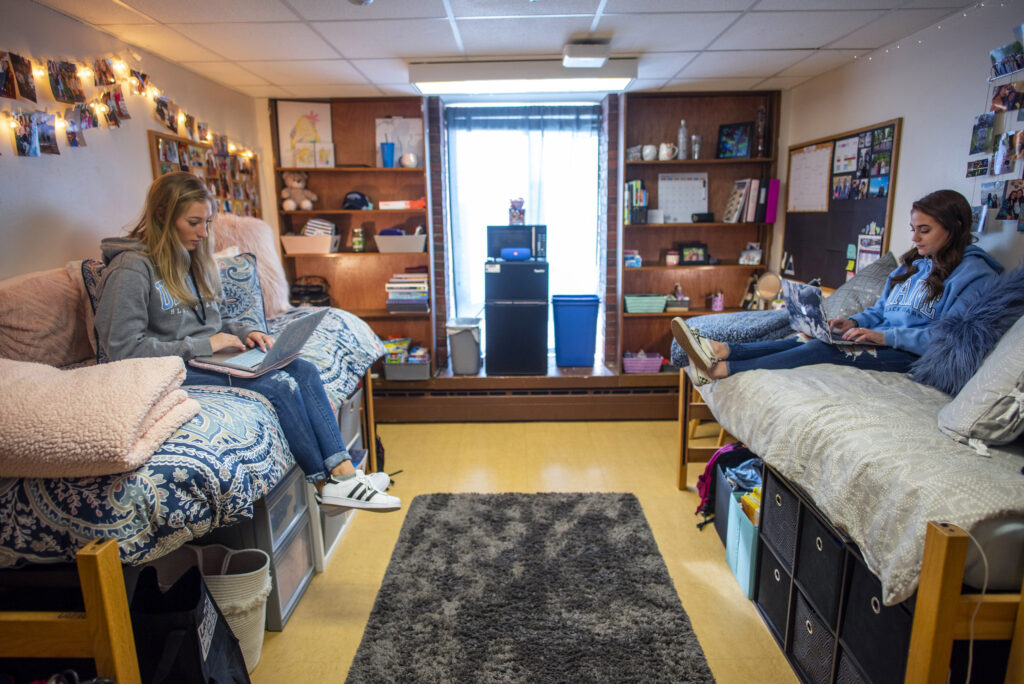 Knox Hall female nursing students in decorated college residence hall room