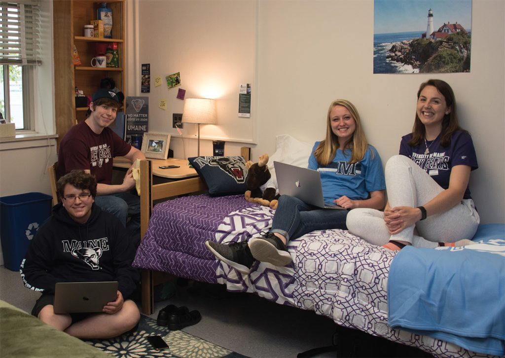 Students visiting in dorm room