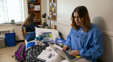 Two female students studying in Penosbscot Hall double room
