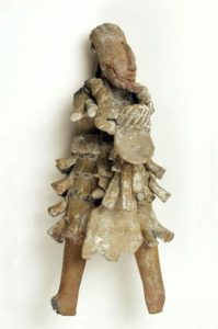 Ceramic figurine made to resemble a person.