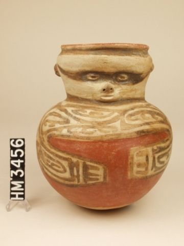 Cocle polychrome ceramic effigy jar. Macaracas type. The arms and chest band contain clawed Y-elements in what may be boa ovals.