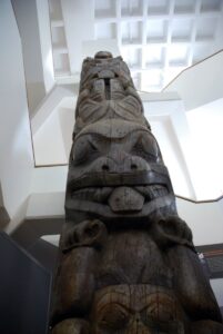 Image of a totem pole taken from the bottom looking up.