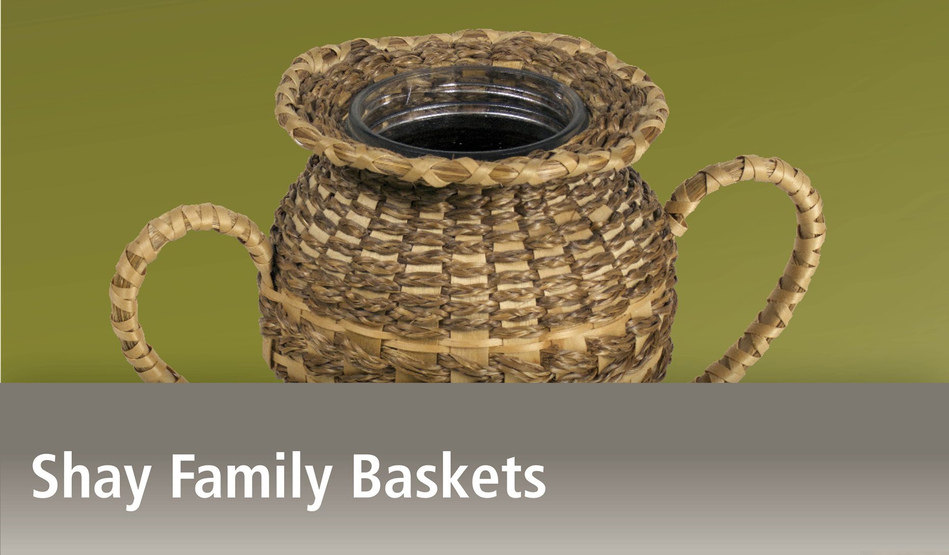 Image of basket in the shape of a trophy with two handles woven around a glass jar using braided sweetgrass above the title Shay Family Baskets.