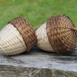 Two small acorn-shaped baskets.