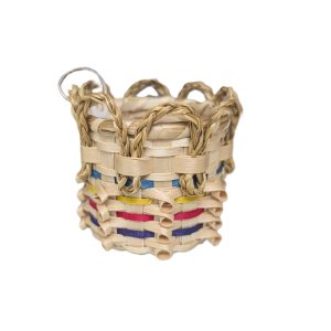 A small sweetgrass basket with blue, yellow, magenta, and purple stripes and sweetgrass braid decoration.