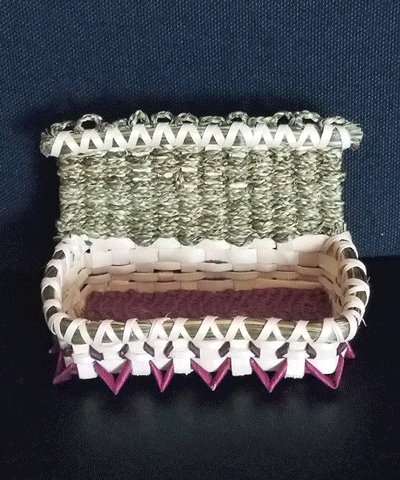 Basket for holding business cards. Small points on base, sweetgrass braids woven into back.