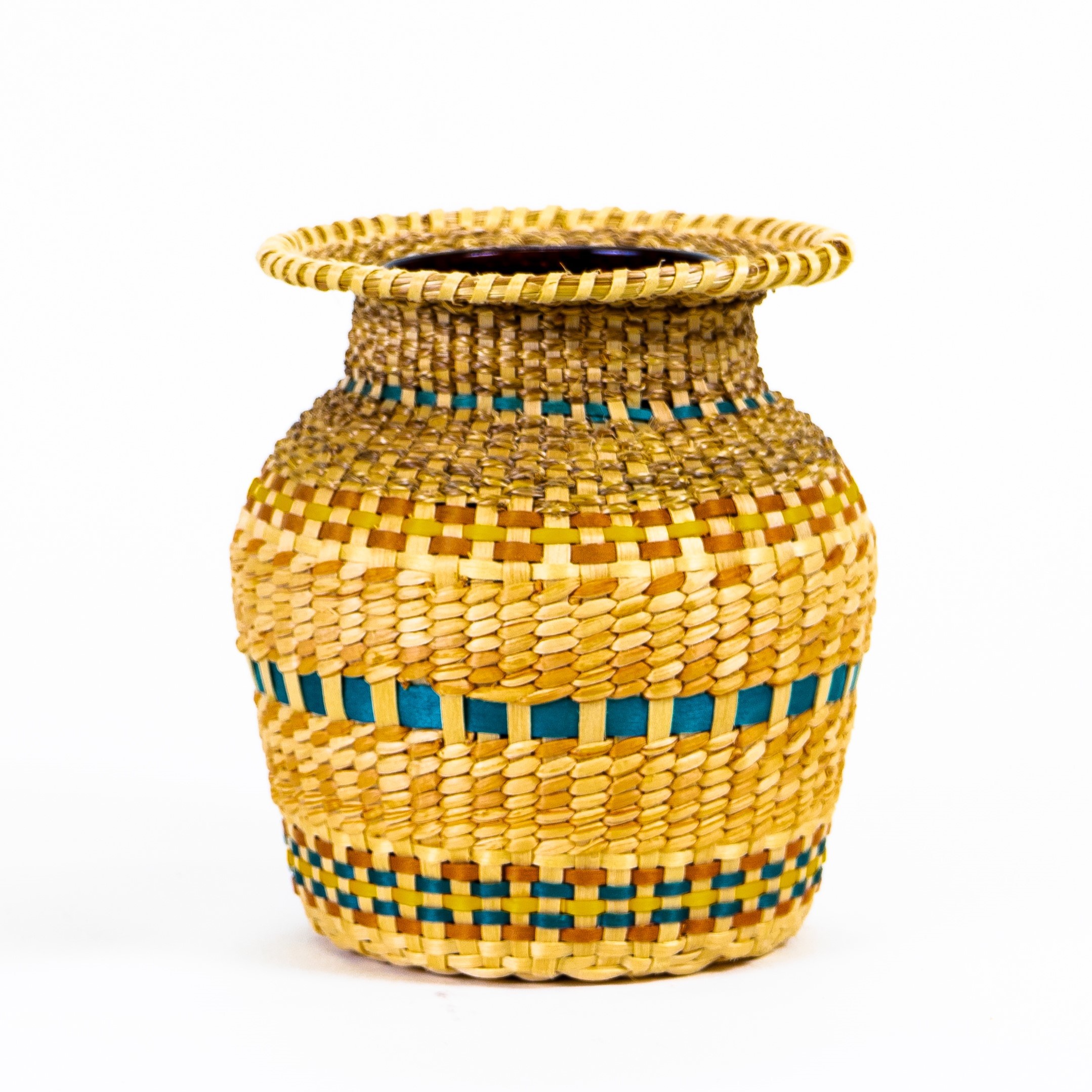 Image of small basket vase with teal and orange details.