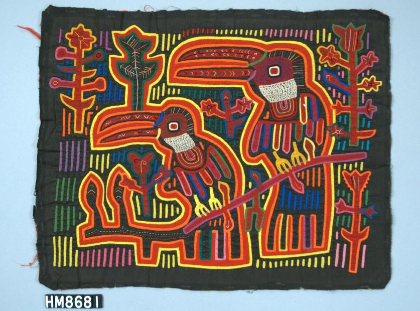 Rectangular fabric with two toucans on a branch against a background of linear decorations and plant motifs.