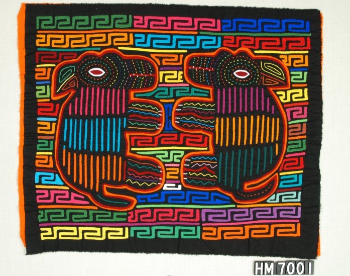 Black rectangular fabric with colorful animals on colorful decorative background.
