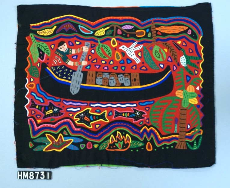 Rectangular fabric depicting a scene of a person in a canoe on a river. The river is bounded by plants and birds, including a ruby-throated humming bird on a palm tree on the near shore. Fish are below the canoe in the river and the canoe is also filled with containers.