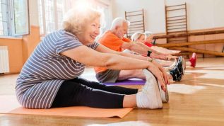 Image of older adults stretching.