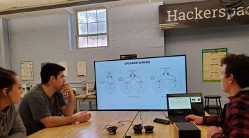 Image of students working in Hackerspace facility.