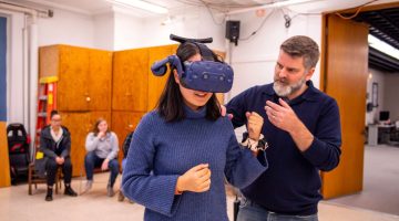 Photograph of person using VR headset