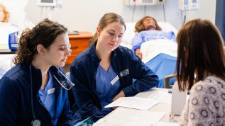 Nursing students in a simulation lab