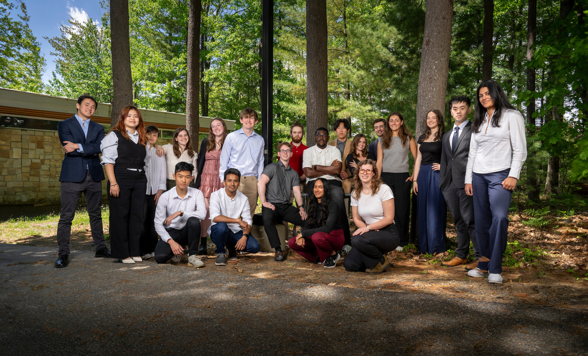A group of Innovate for Maine interns pose outside of the Foster Center