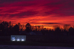 UMaine sign at sunset
