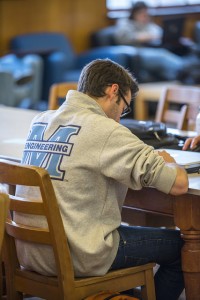 Student studying in Fogler library