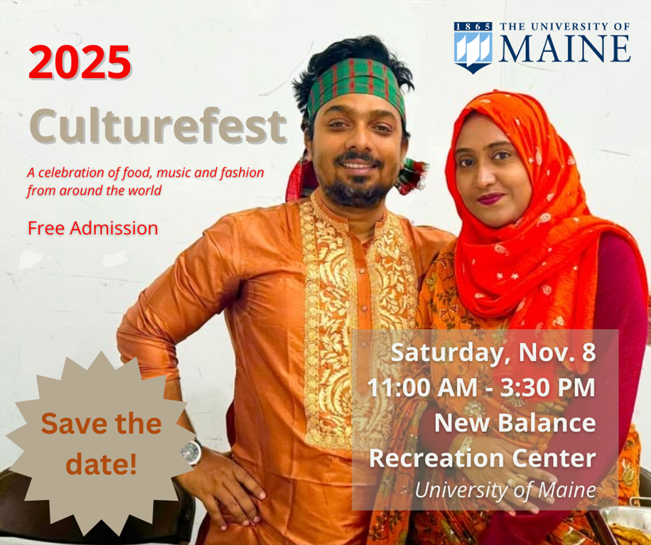 male and female student pose together in traditional garb