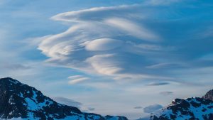 photo showing lenticular clouds over the Juneau ice field in southeast Alaska where the UMaine team intends to conduct research for this partnership project
