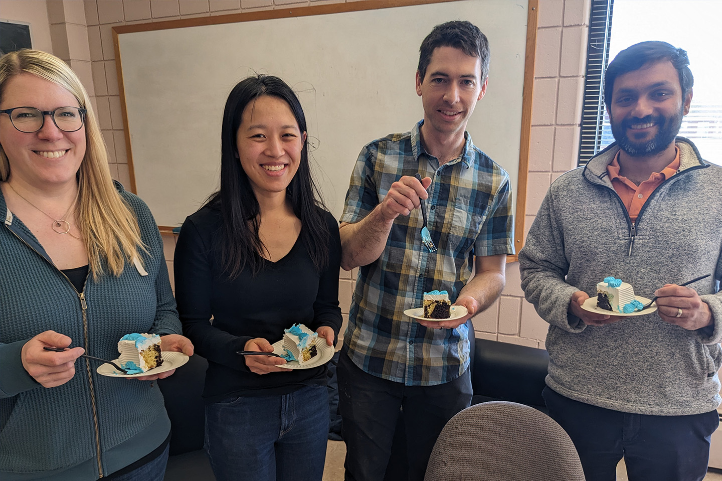 Photo of 4 faculty members from the Mathematics and Statistics Department