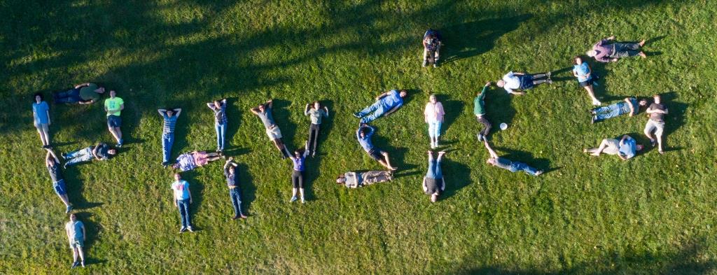 Physics students spelling out physics on the ground