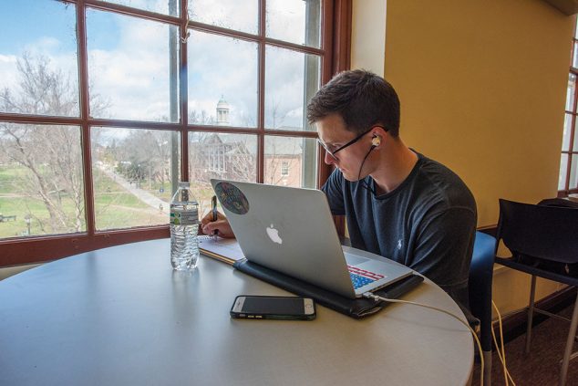 Student studying in library