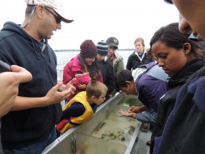 Brown undergraduates learn about the coastal ecology and human history of the bay from John Torgan, Coastal and Marine Program Director for the RI chapter of The Nature Conservancy