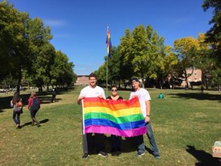 MAAV members holding rainbow flag