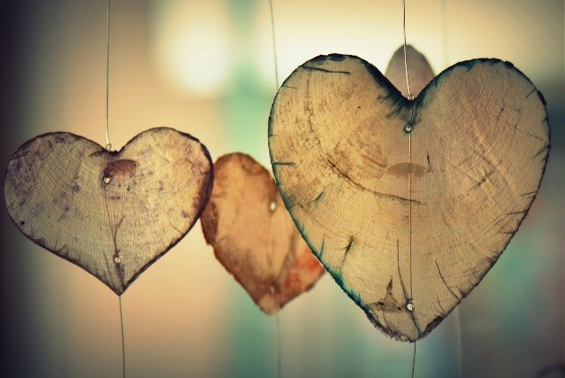 paper hearts hanging from string