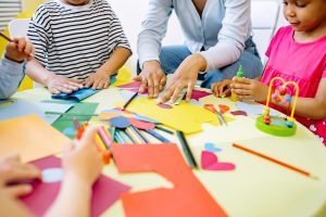 children around a classroom table