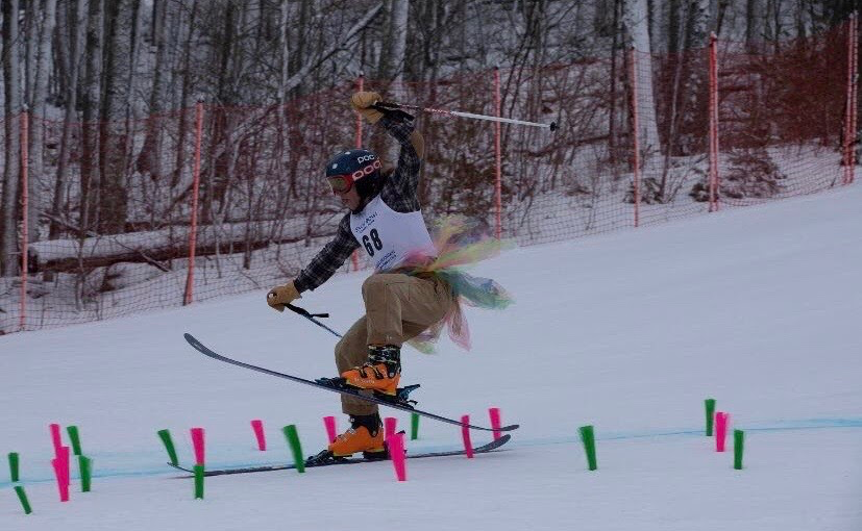 man skiing in a costume