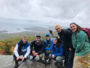 group on top of a mountains