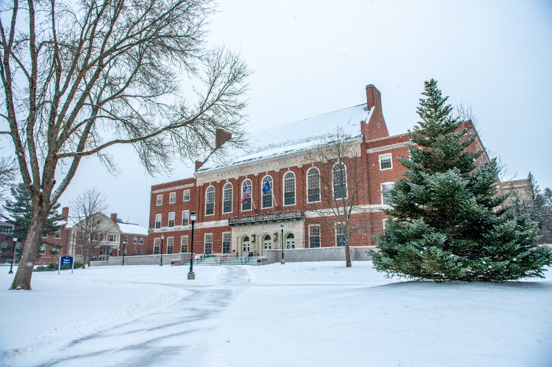 A snowy Fogler Library in winter