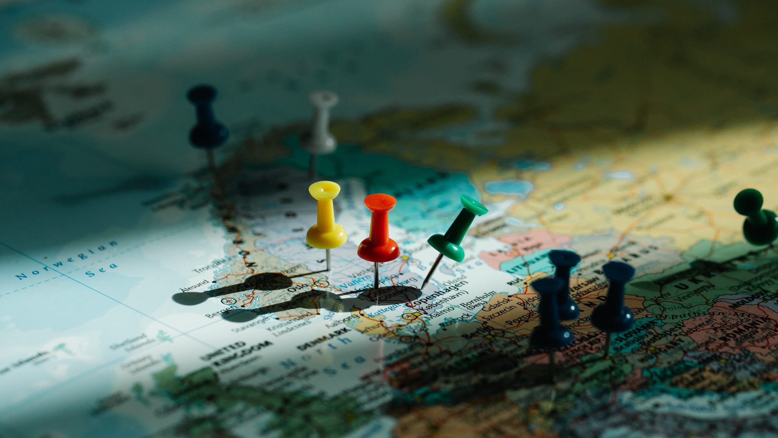 A photo of tacs on a map
