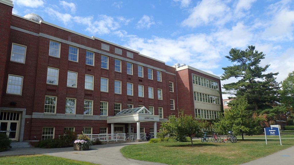 Photo of Aubert Hall on a sunny day.