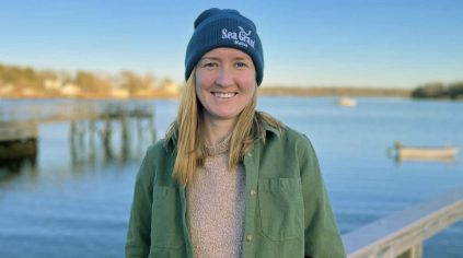 Annie Fagan standing on a dock