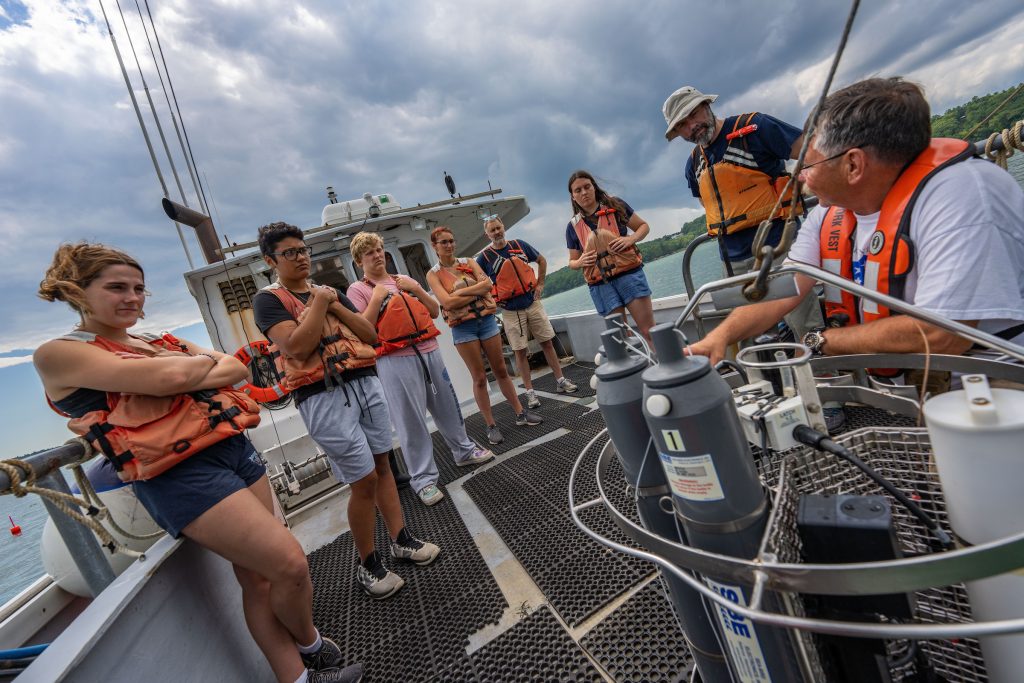 First year SMS students on a boat at the Darling Marine Center.